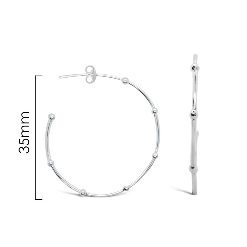Hoops With Balls Earrings