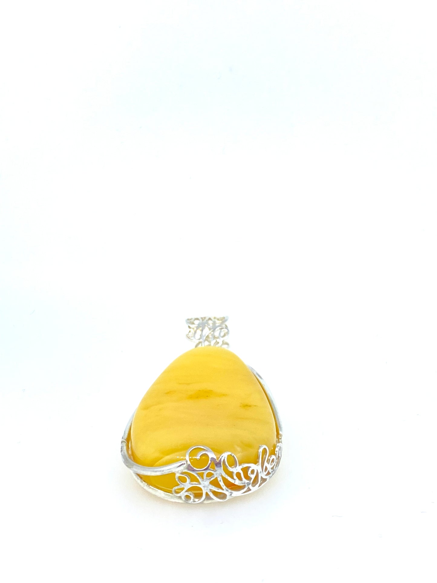 Large yellow Amber and fancy bezel Pendant