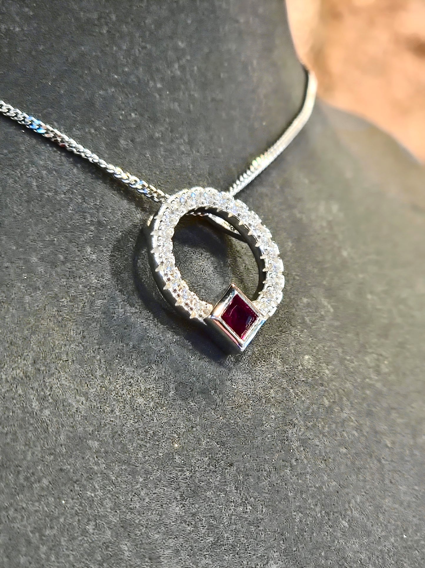 Circle Pendant with Red CZ Accent