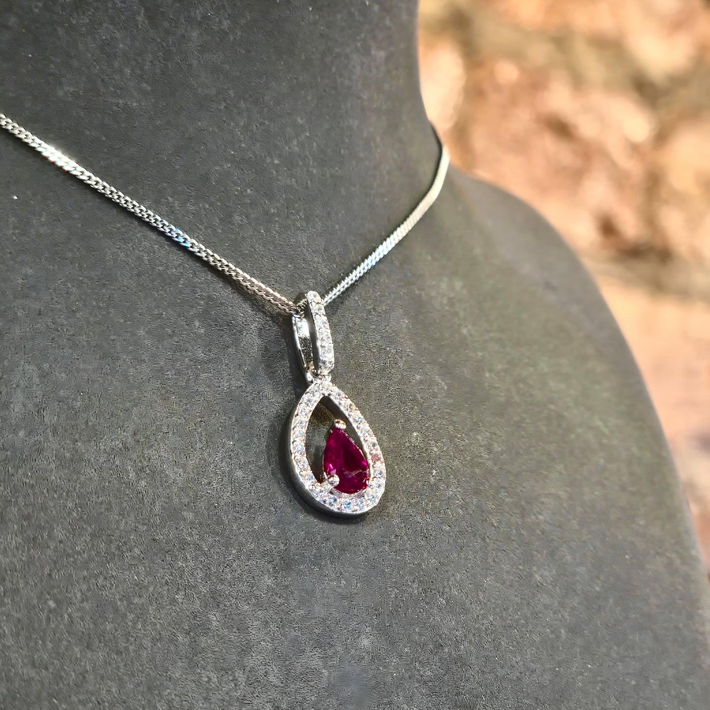 Pear-Cut Red CZ Halo Pendant